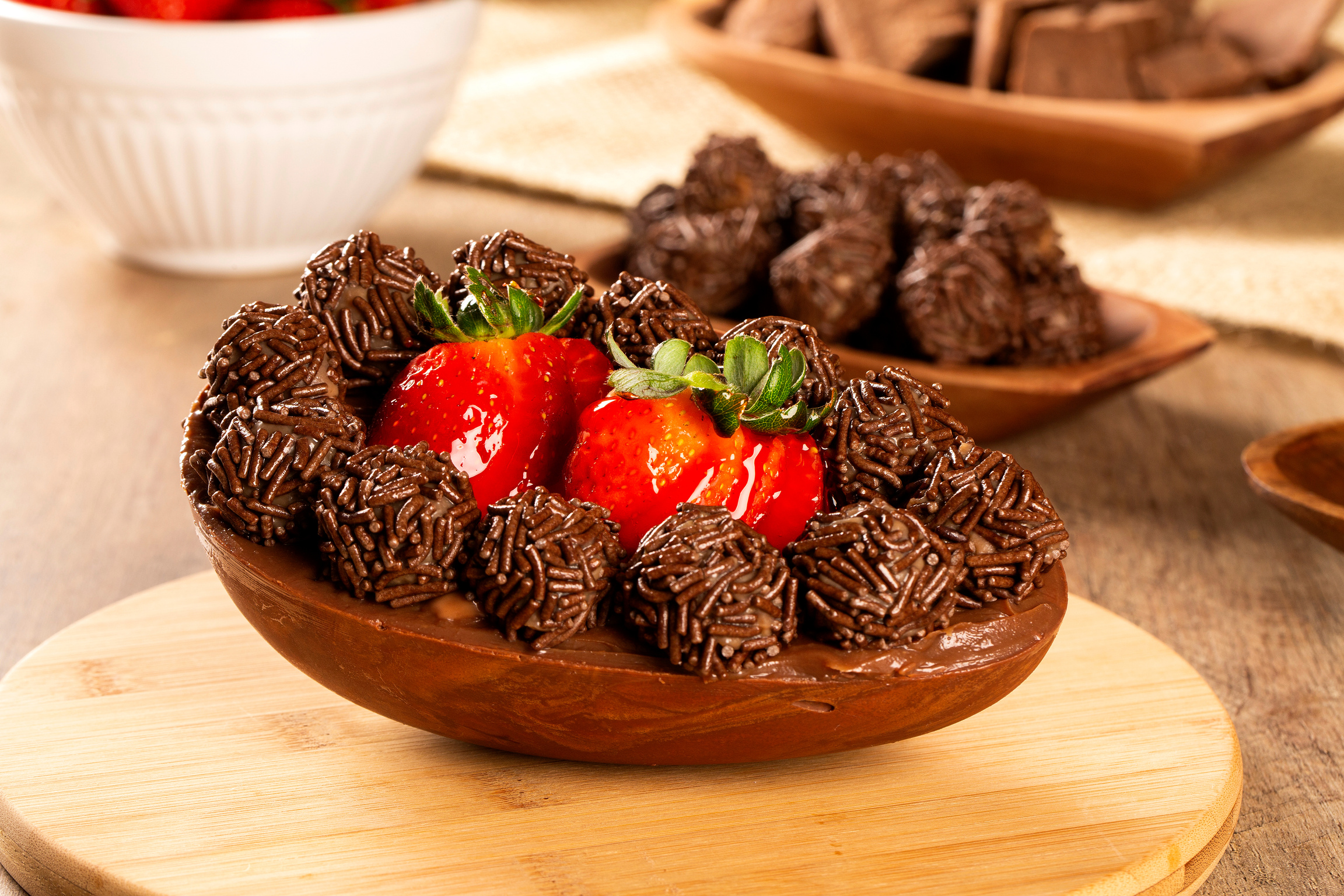 Gourmet easter egg, stuffed with chocolate and strawberry. Easter egg with pudding cream, Easter dessert. Easter concept.